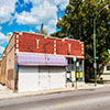 Shuttered commercial buildings on 87th Street